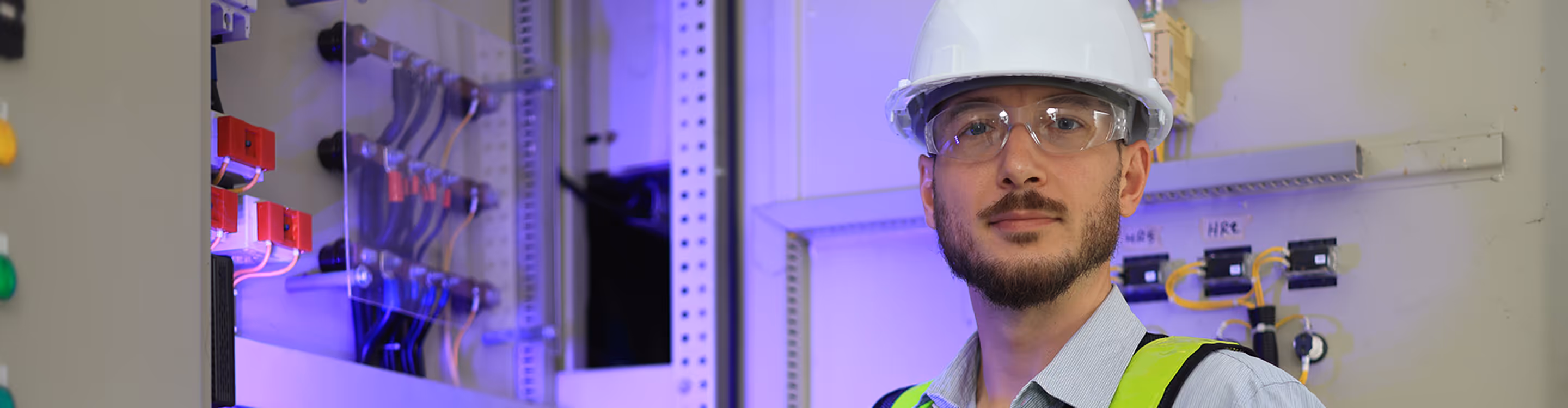 Power quality specialist working with measurement equipment